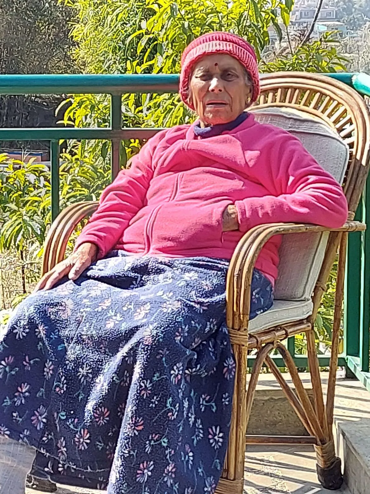 Resident resting in a garden chair