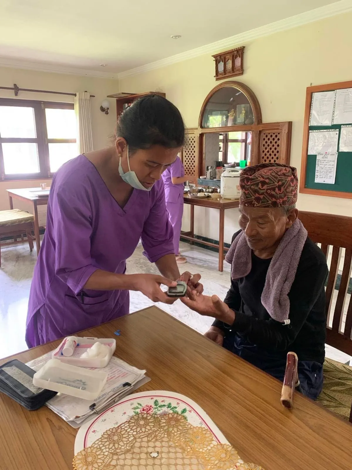 Nurse caring for a resident